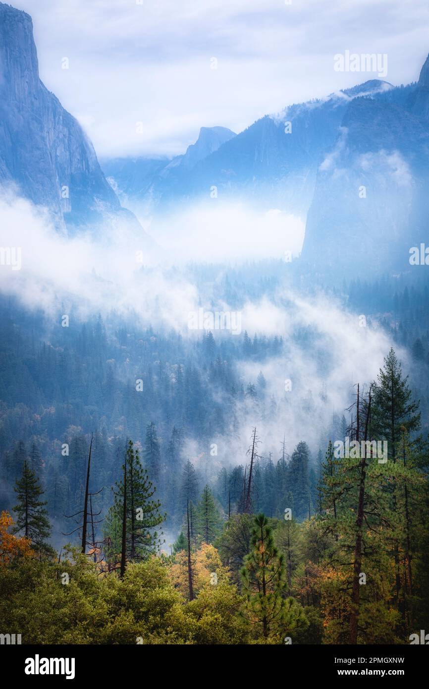 The cloud and fogged landscape of Yosemite Valley from Tunnel View.  Yosemite National Park, California. Stock Photo