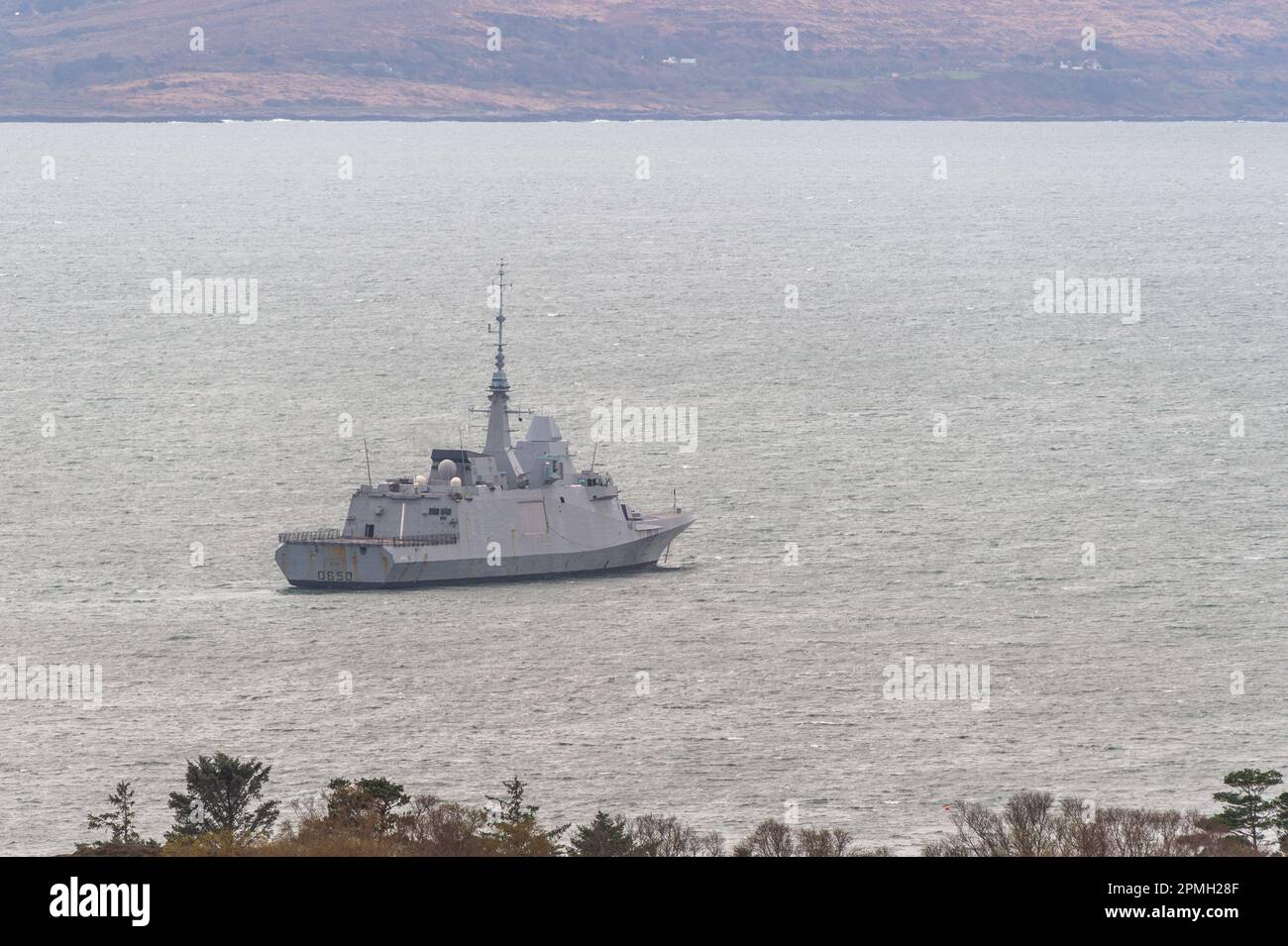 Glengarriff, West Cork, Ireland. 13th Apr, 2023. The French NATO frigate 'Aquitaine', which had been sheltering in Bantry Bay, off Glengarriff, has sailed out to sea. The warship changed her course from Oslo, Norway to an undisclosed location on Monday to shelter from Storm Noa, which hit the region on Wednesday. Credit: AG News/Alamy Live News Stock Photo