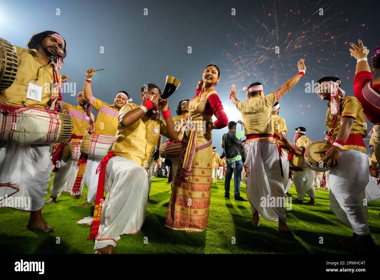 Assamese dancers in traditional attire perform as they attempt Guinness