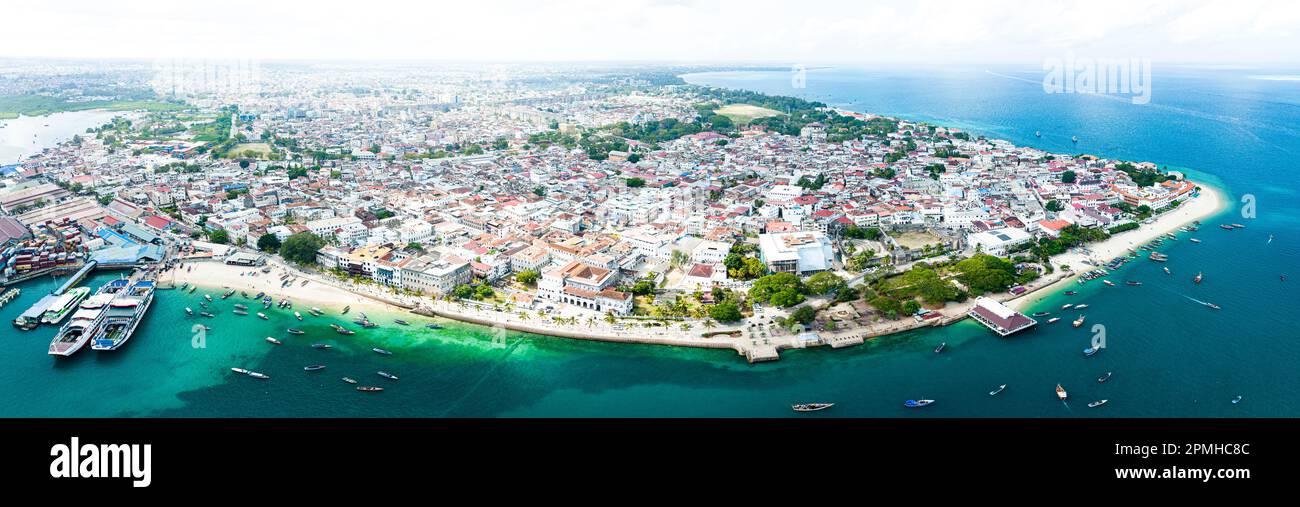 Aerial panoramic view of Stone Town and the clear water of the Indian Ocean, Zanzibar, Tanzania, East Africa, Africa Stock Photo