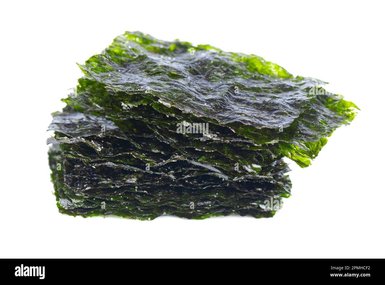 Crispy nori seaweed isolated on white background. Japanese food nori. Dry seaweed sheets Stock