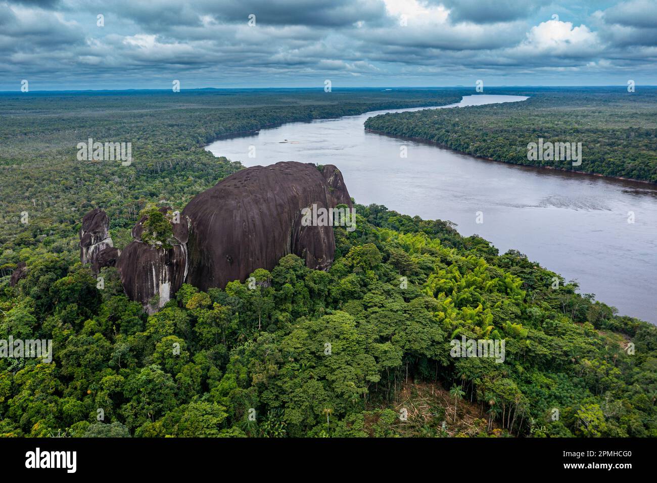 Aerial of the Curimacare Rock on the Casiquiare River in the deep south of Venezuela, South America Stock Photo