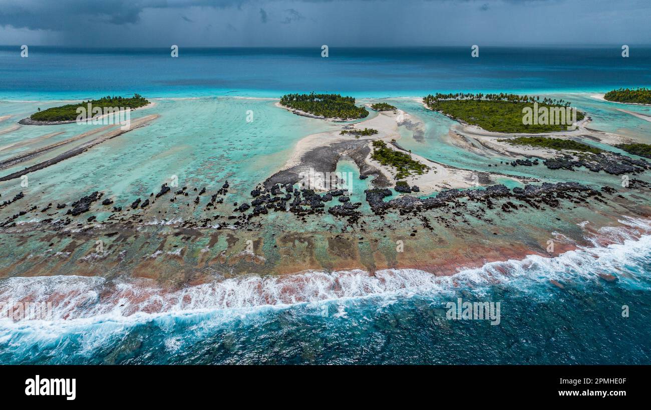 Aerial of the elevated reefs of Ile aux Recifs, Rangiroa atoll, Tuamotus, French Polynesia, South Pacific, Pacific Stock Photo
