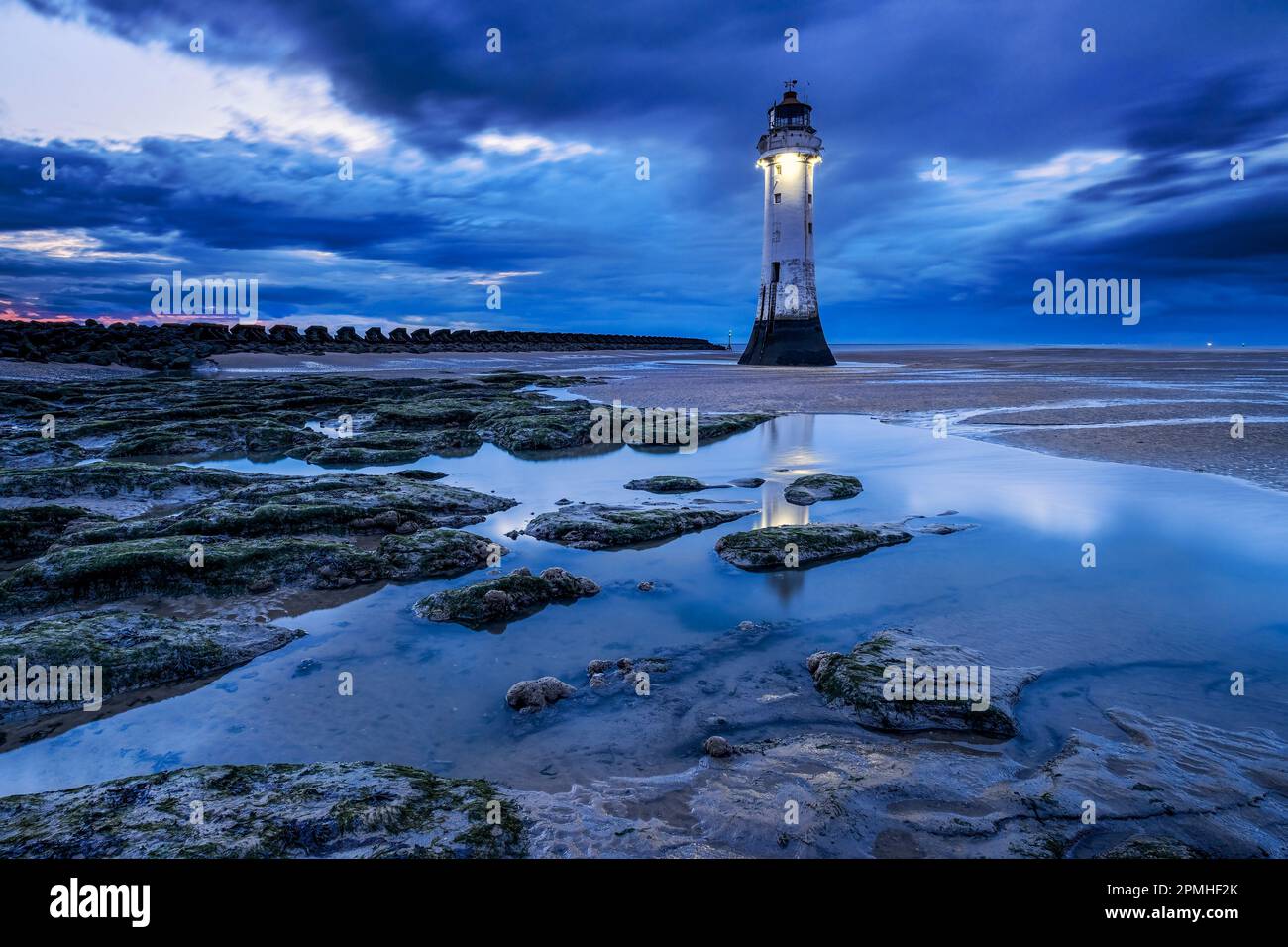 Perch Rock Lighthouse and the sands of New Brighton at twilight, New Brighton, The Wirral, Merseyside, England, United Kingdom, Europe Stock Photo