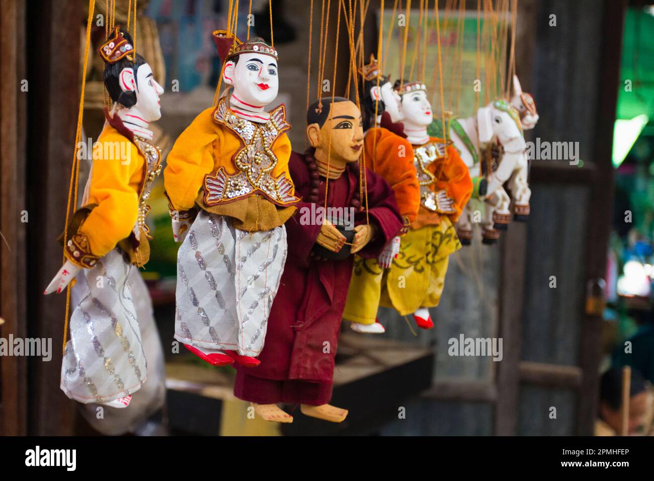 Close-up of Burmese puppet (Yoke the) (marionettes) hanging from strings on market, Nyaungshwe, Lake Inle, Shan State, Myanmar (Burma), Asia Stock Photo