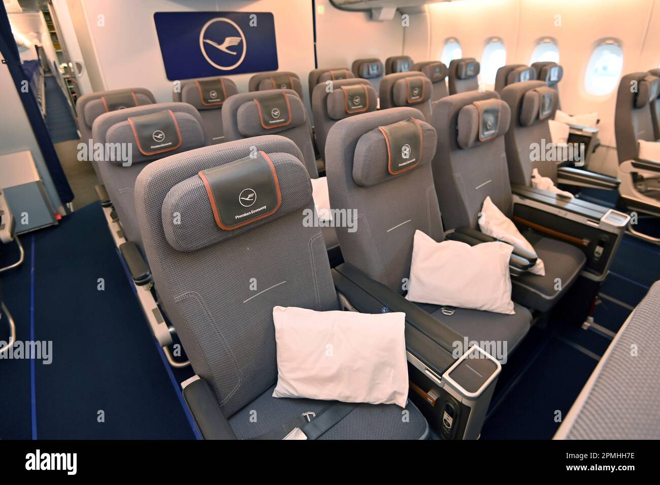 Lufthansa Airbus A380 long-haul aircraft will land again for the first time in Munich at Franz Josef Strauss Airport on April 12, 2023. Premium economy class, rows of seats, seats, seats, empty airplane cabin with no passengers. ? Stock Photo