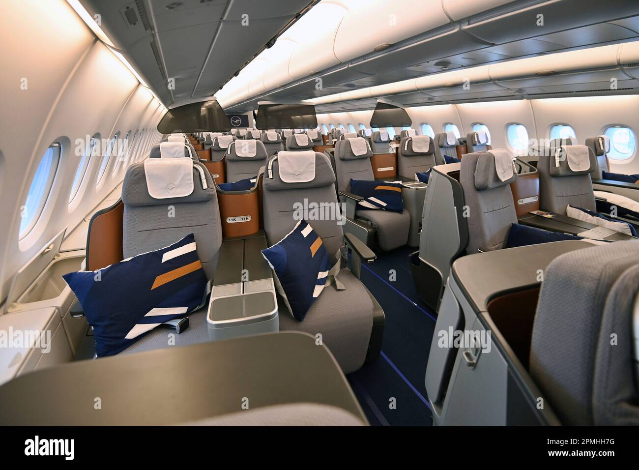 Lufthansa Airbus A380 long-haul aircraft will land again for the first time in Munich at Franz Josef Strauss Airport on April 12, 2023. Business class, rows of seats, seats, seats, empty airplane cabin with no passengers. ? Stock Photo
