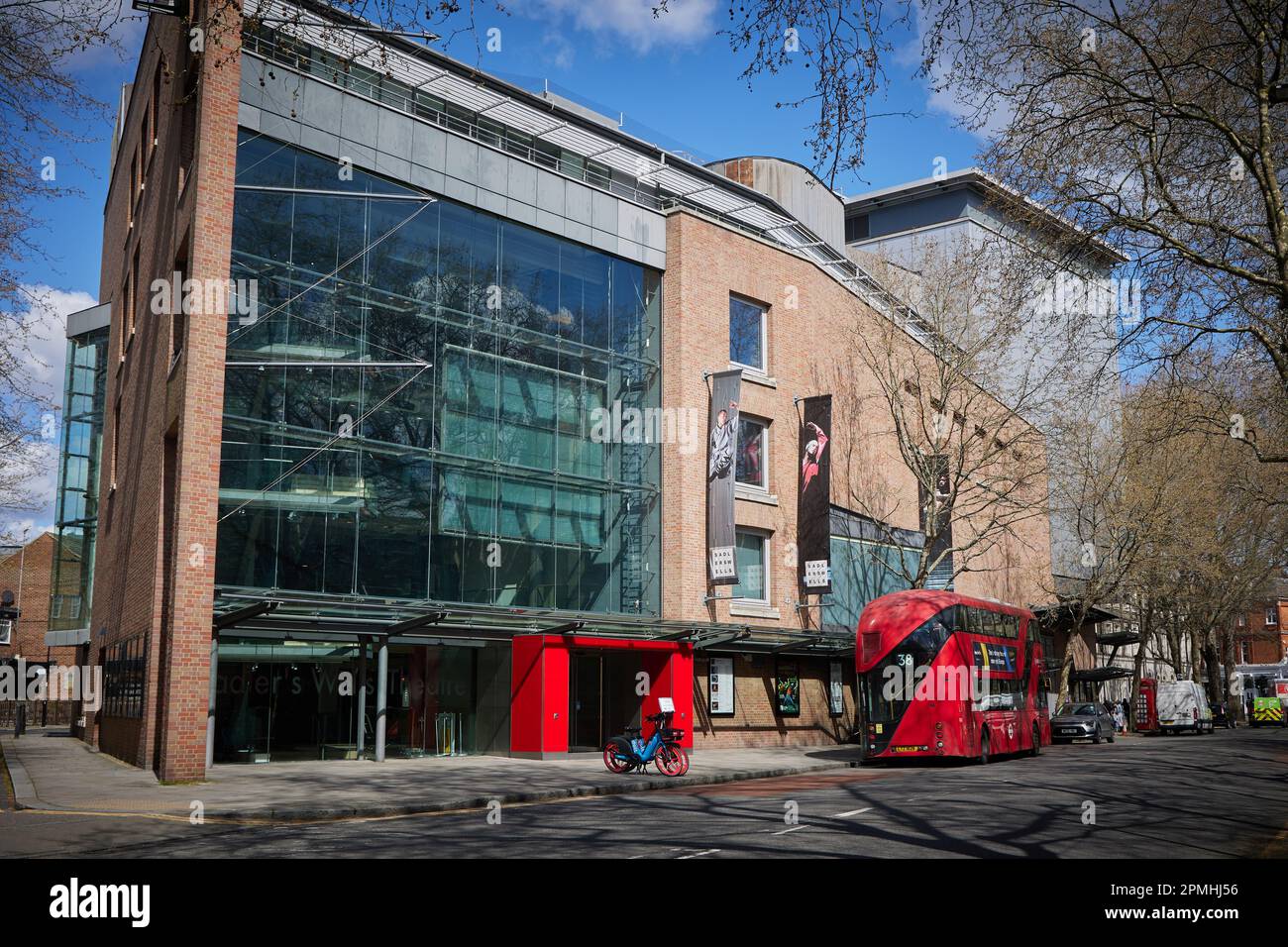 The Number 38 New Routemaster double-decker bus outside Sadler's Wells Theatre, Angel, Islington, London, England, United Kingdom. Stock Photo