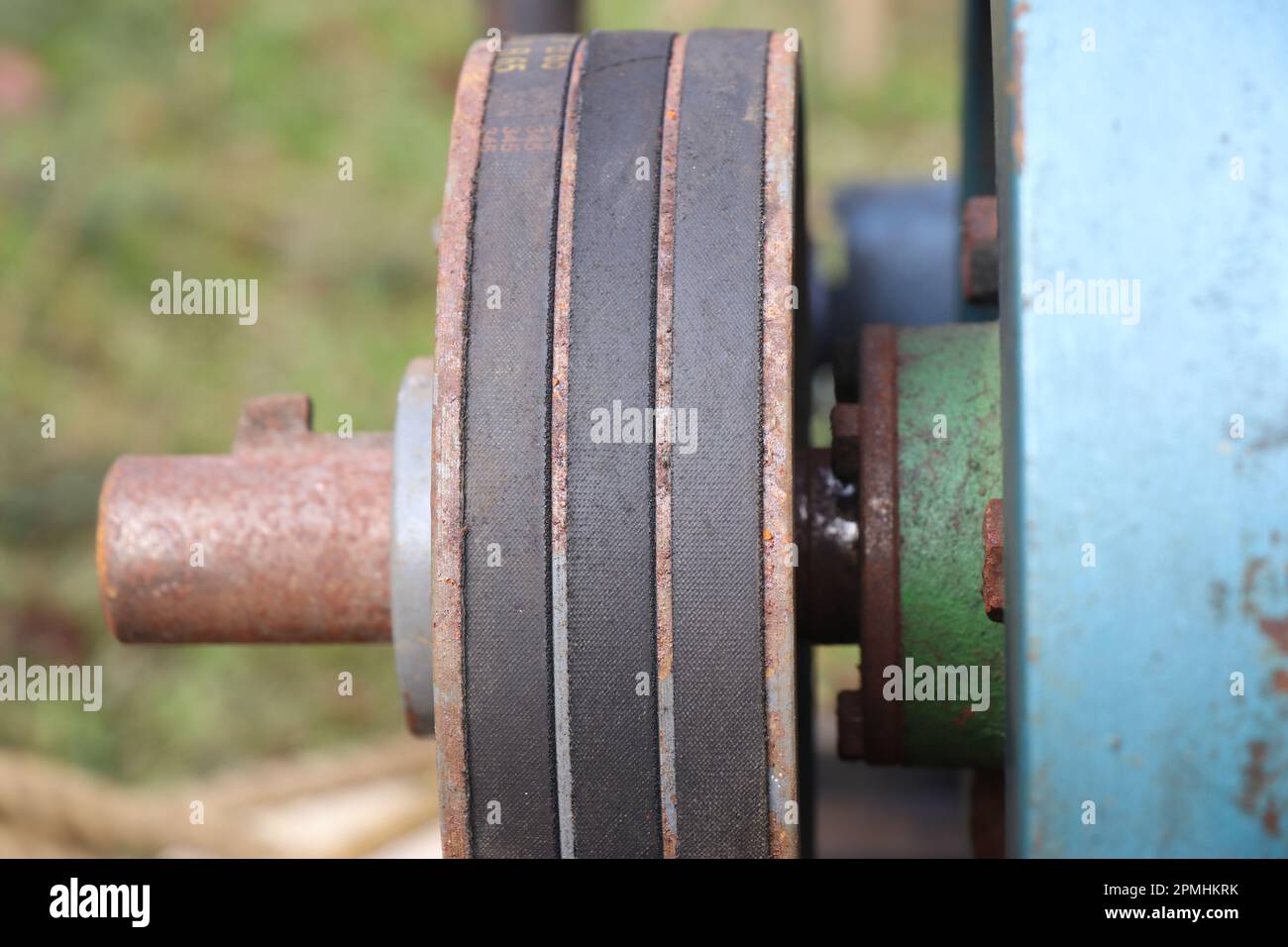 Belt of Diesel engine water pump, Close up of belt transmission system between the engine and the centrifugal water pump Stock Photo