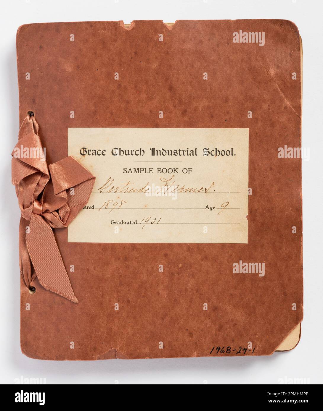 Sewing Instruction Book (USA); Made by Gertrude Hermes; Student at Grace Church Industrial School; paper, silk cotton, metal grommets Stock Photo