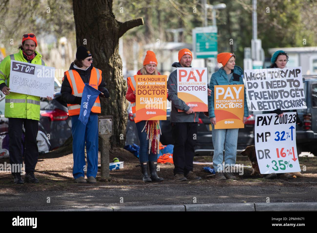 Truro, UK. 13th Apr, 2023. A group of Junior Doctors stand on a Picket Line outside The Royal Cornwall Hospital, Truro holding Placards stating ‘Pay Junior Doctors' along with others during the demonstration. This is as Junior Doctors stage a 4 day strike over pay and work conditions at the NHS. (Photo by Benjamin Gilbert/SOPA Images/Sipa USA) Credit: Sipa USA/Alamy Live News Stock Photo