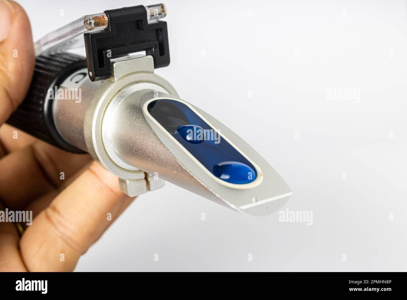 Refractometer used to measure the salinity level in marine aquarium