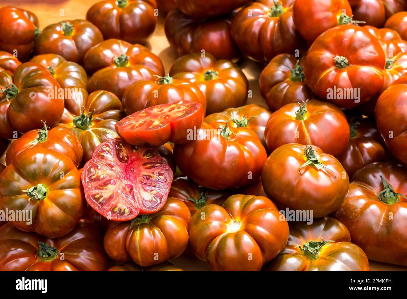 Coeur de Boeuf or Oxheart Tomatoes (Solanum lycopersicum) Stock Photo