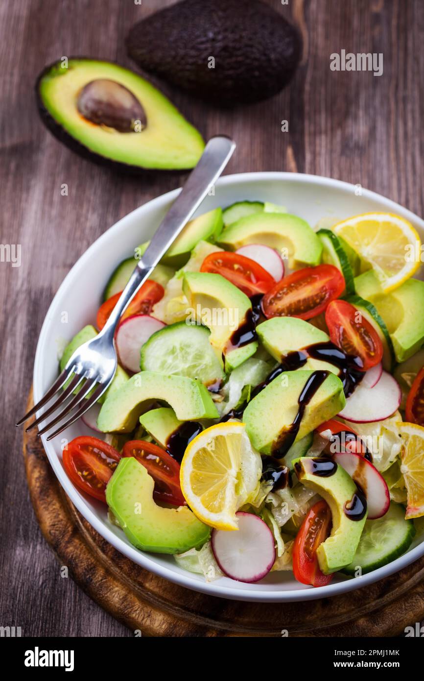 Fresh avocado salad with lemon Stock Photo