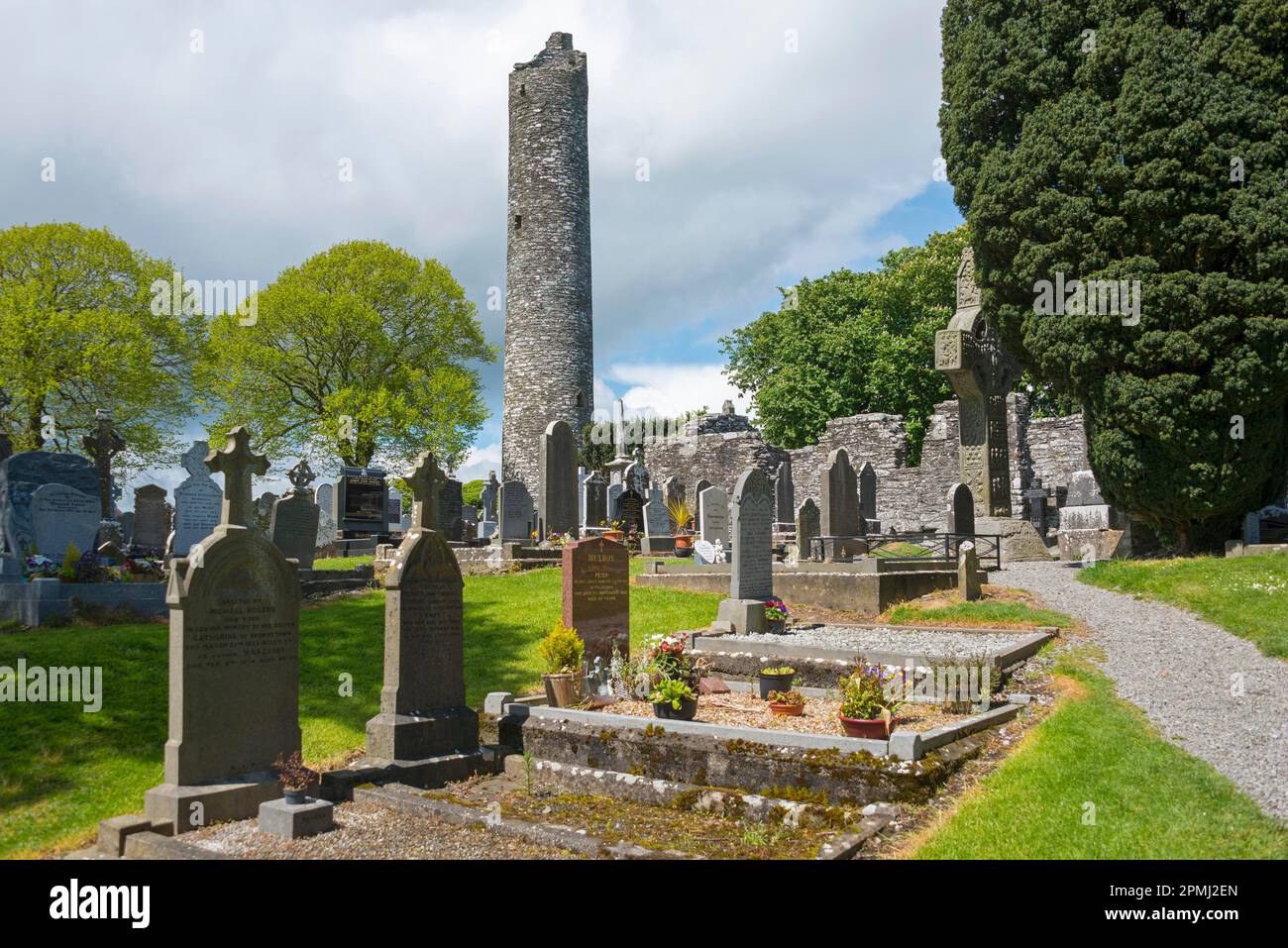 Crosses with Round Tower, Monasterboice, County Lough, Ireland, Monastery Ruins, Mainistir Bhuithe Stock Photo