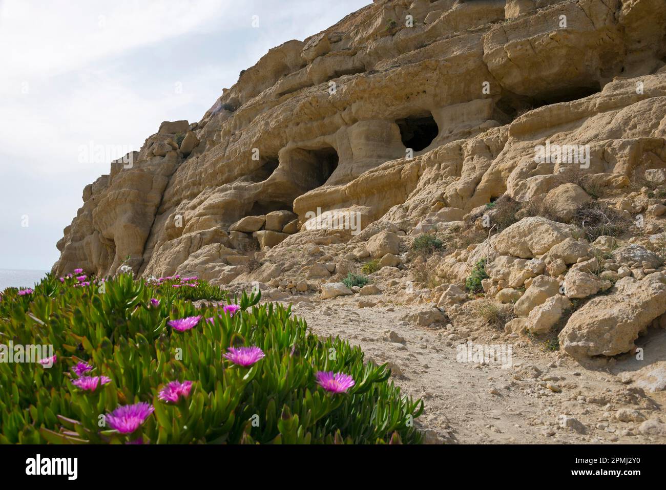 Rock caves, residential caves, Matala, Crete, Greece Stock Photo Alamy