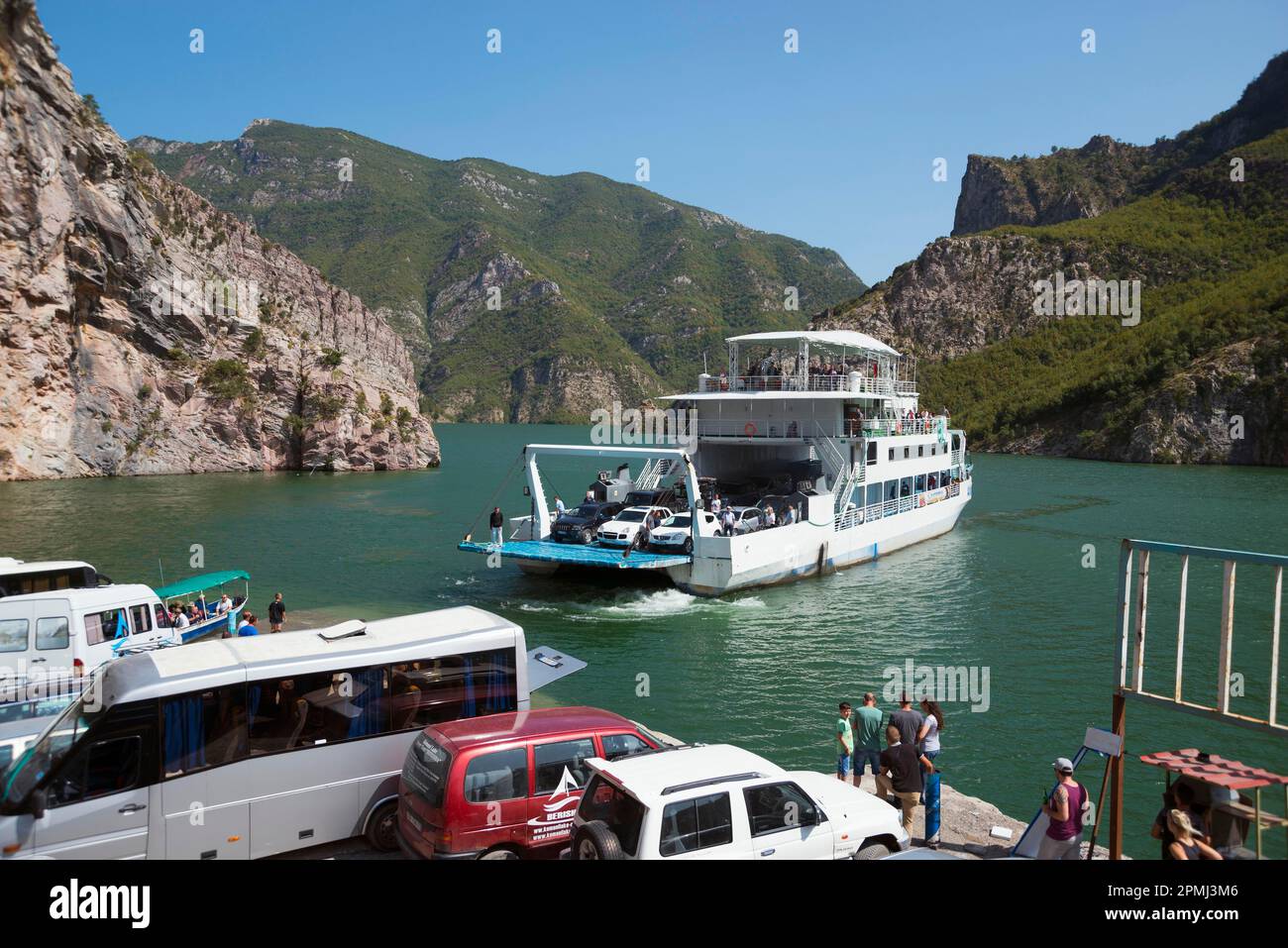 Alpine ferry, ferry dock, Koman, Koman reservoir, Drin river, Albania Stock Photo