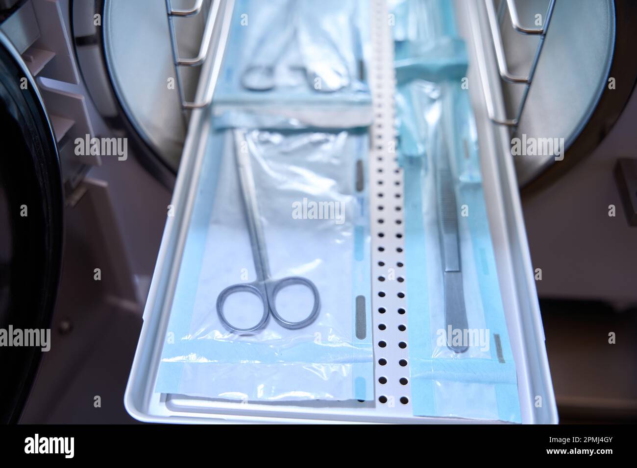 Top view of sterilizing medical instruments in an autoclave Stock Photo