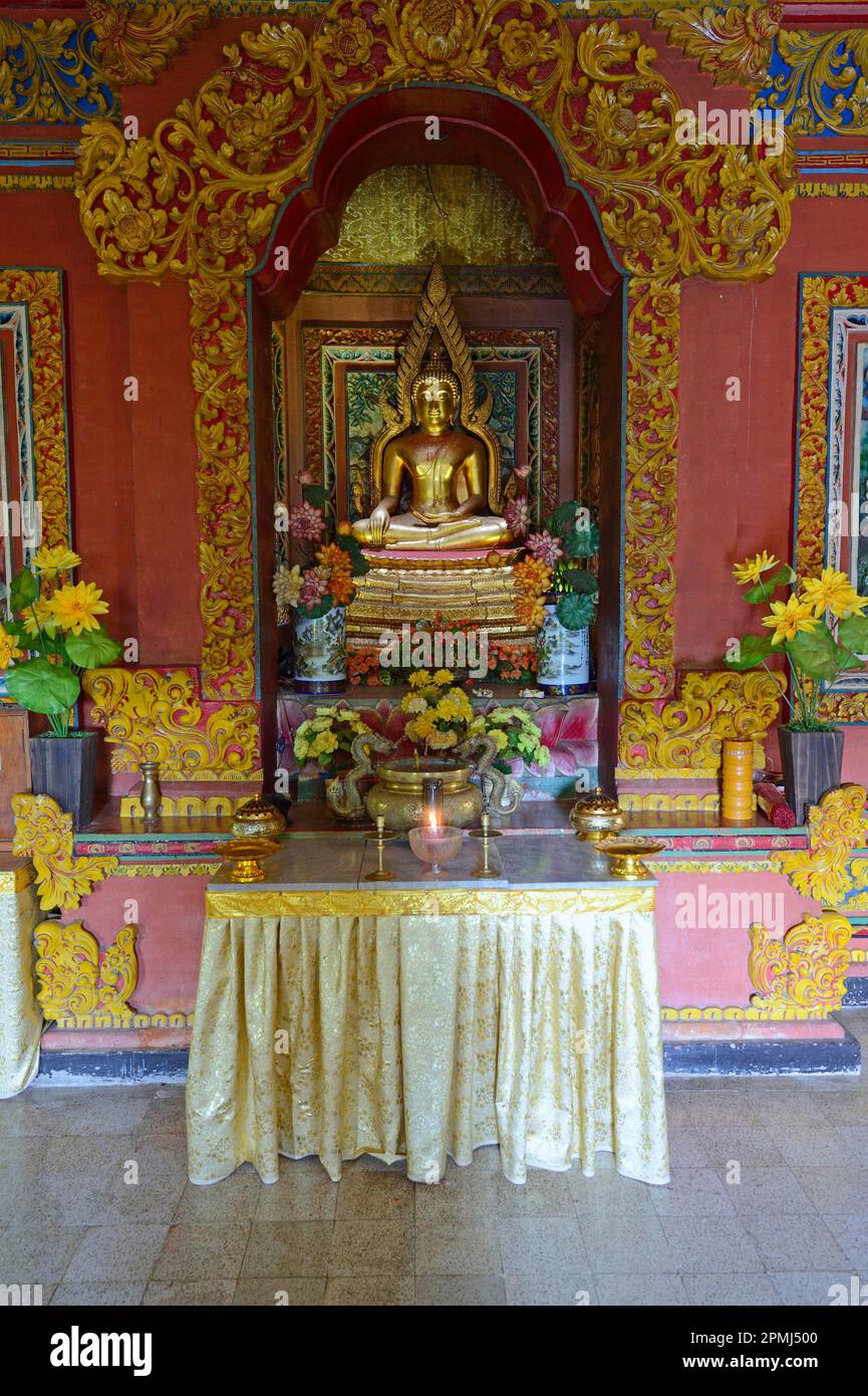 Buddha statue on altar in prayer room of the Buddhist monastery Brahma Vihara, Banjar, North Bali, Bali, Indonesia Stock Photo
