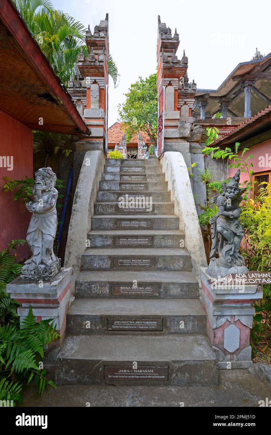 Access stairs, with pious sayings on each step, Brahma Vihara Buddhist Monastery, Banjar, North Bali, Bali, Indonesia Stock Photo