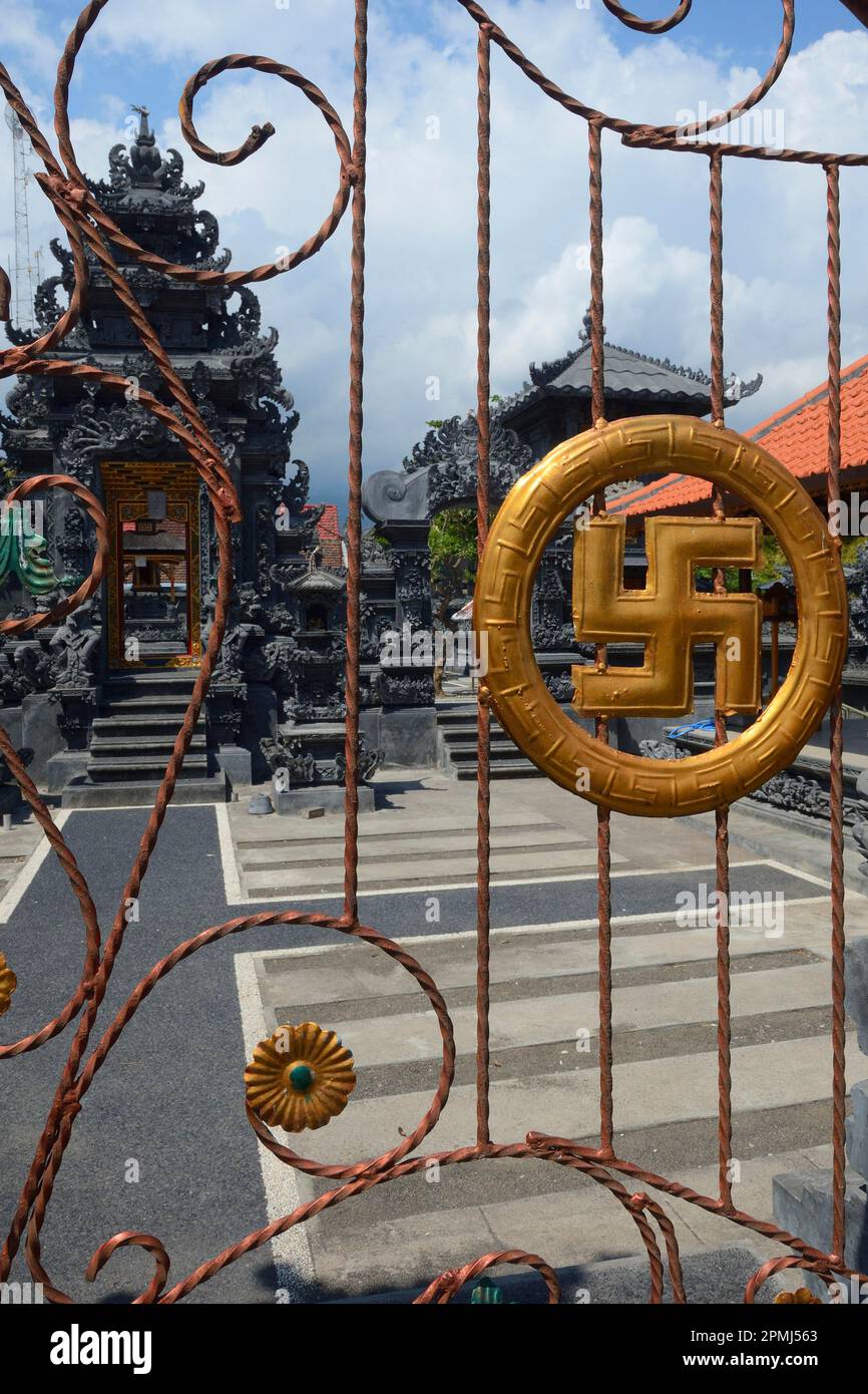 Gate with swastika as swastika, symbol of luck in Hinduism, Temple Pura Segara, Lovina Beach, North Bali, Bali, Indonesia Stock Photo