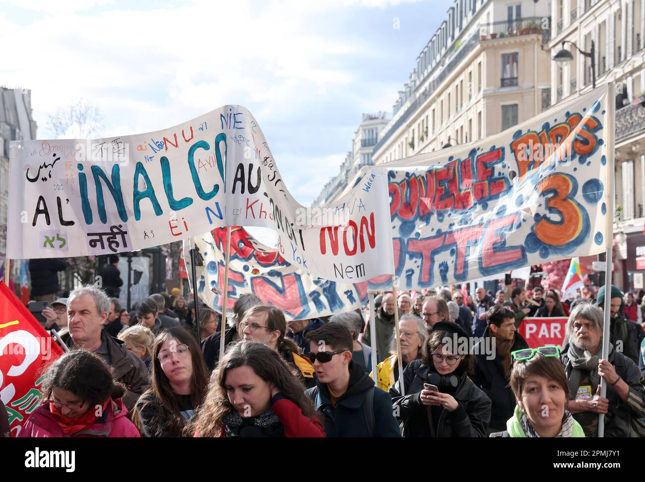 Paris, France. 13th Apr, 2023. Demonstrators hold placards as they march along the streets of Paris, on Thursday, April 13, 2023. French trade unions urged a show of force on the streets a day before the Constitutional Council's ruling on the legality of the bill to raise the retirement age by two years to 64. Photo by Maya Vidon-White/UPI Credit: UPI/Alamy Live News Stock Photo