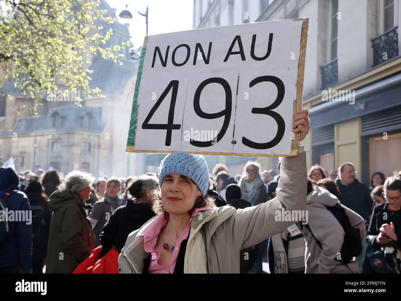 Paris, France. 13th Apr, 2023. Demonstrators hold placards as they march along the streets of Paris, on Thursday, April 13, 2023. French trade unions urged a show of force on the streets a day before the Constitutional Council's ruling on the legality of the bill to raise the retirement age by two years to 64. Photo by Maya Vidon-White/UPI Credit: UPI/Alamy Live News Stock Photo
