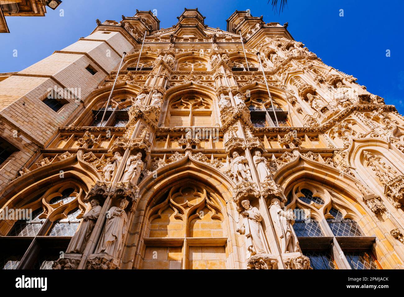 Detail. Town Hall of Leuven, Flemish Brabant, is a landmark building on that city's Grote Markt, main square. Built in a Brabantine Late Gothic style Stock Photo