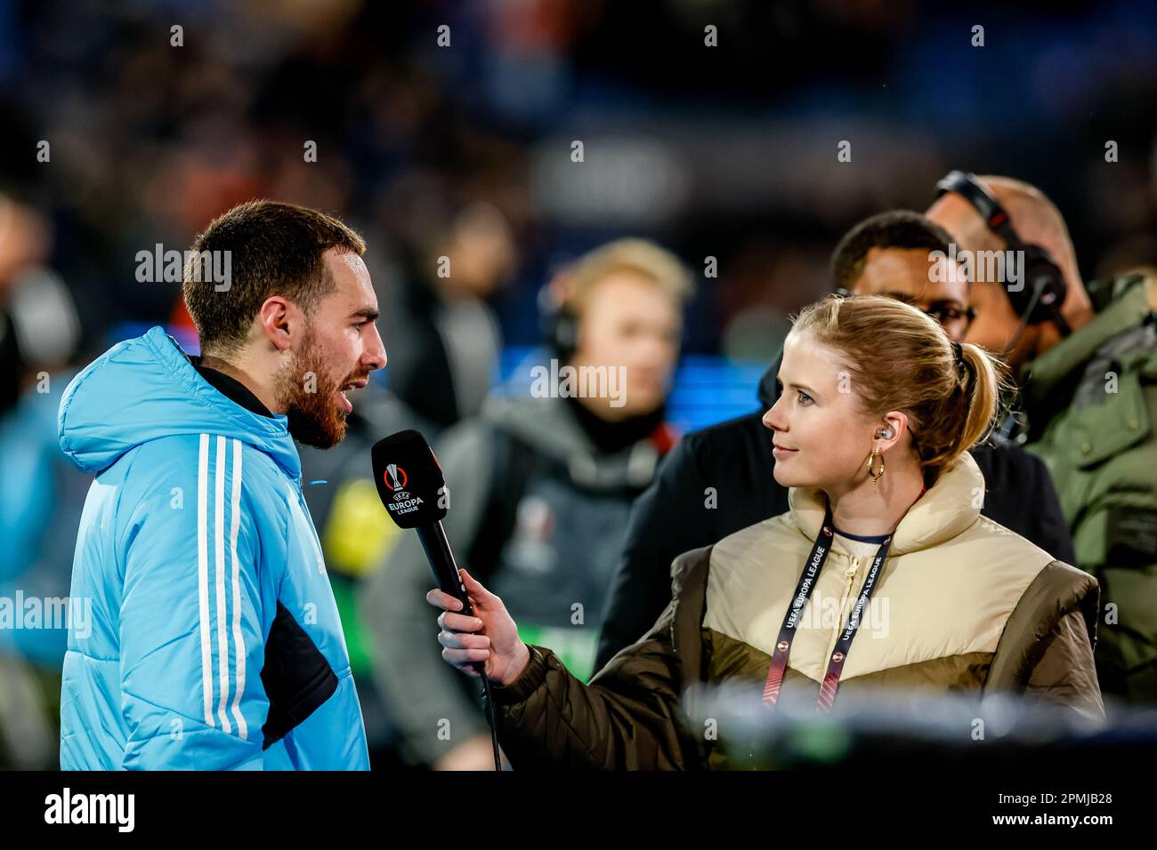 Stadion Feijenoord, Netherlands. 13th Apr, 2023. STADION FEIJENOORD, NETHERLANDS - APRIL 13: Orkun Kokcu of Feyenoord is interviewed by Noa Vahle presenter of RTL 7 during the Quarterfinal First Leg - UEFA Europa League match between Feyenoord and AS Roma at the Rotterdam on April 13, 2023 in Stadion Feijenoord, Netherlands (Photo by Marcel ter Bals/Orange Pictures) Credit: Orange Pics BV/Alamy Live News Stock Photo