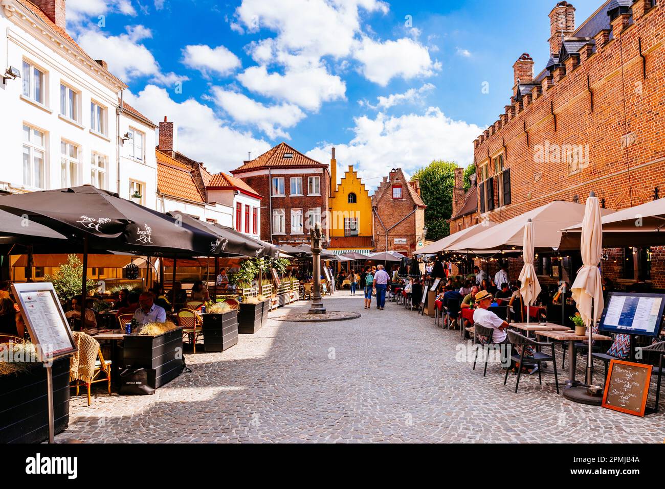Lively terraces in Tanners Square, Huidenvettersplein. In the Middle