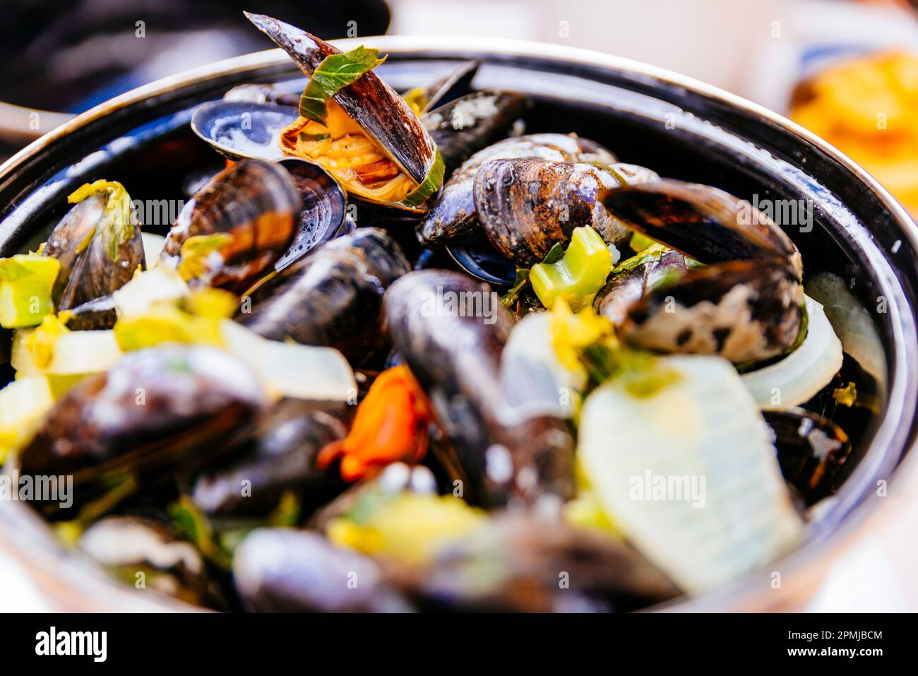 Traditional belgian food. Moules-frites or moules et frites. Mussels with fries. Moules marinière. Mussels. Bruges, West Flanders, Belgium, Europe Stock Photo