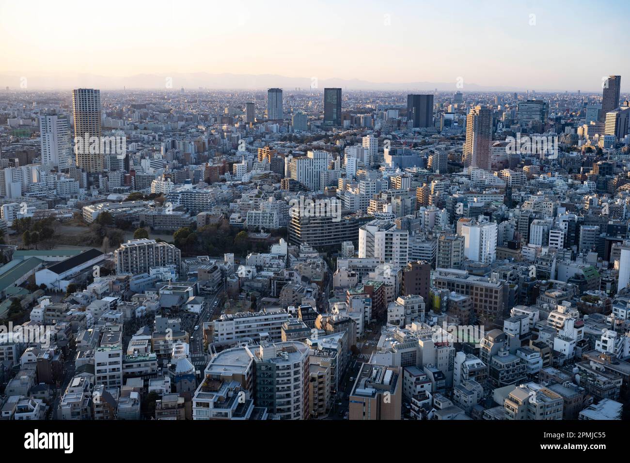 Tokyo, Japan. 9th Feb, 2023. The skyline urban cityscape at sunset viewed  from Ebisu.The population of Tokyo is about 13.9 million people while the  metropolitan area is about 40 million people, making