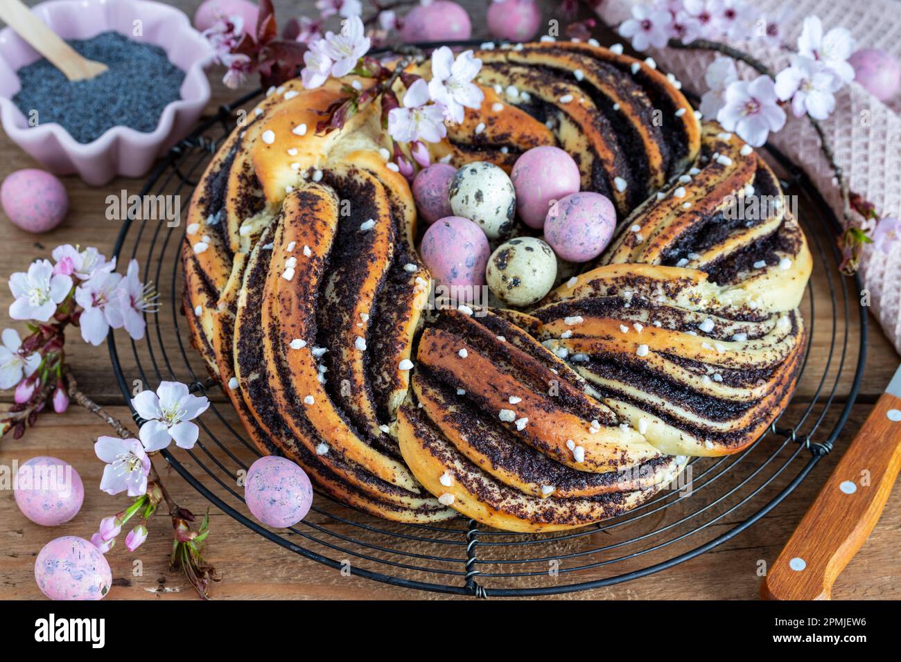 easter bakery yeast plait with poppy seed filling Stock Photo