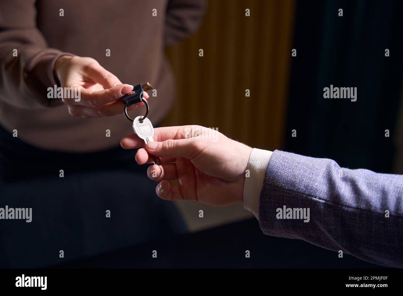 Key Guest Woman reception passes documents man hi-res stock photography and ...