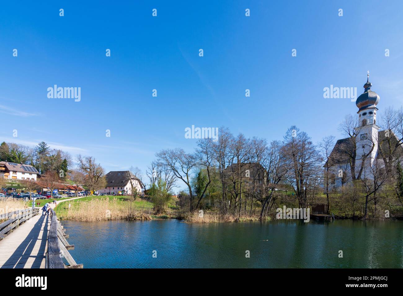 Anger church St. Peter und Paul and former abbey Höglwörth, lake
