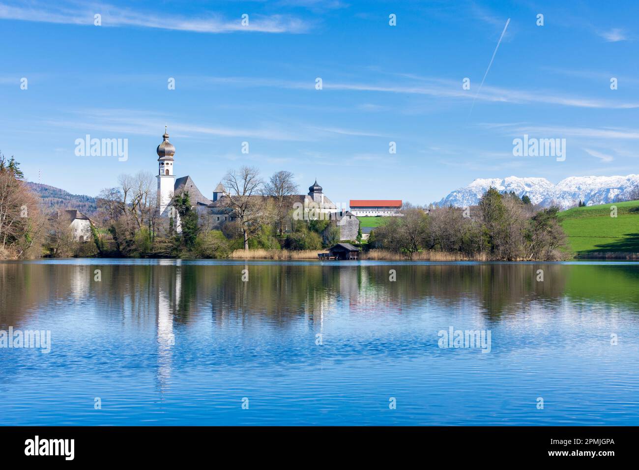 Anger church St. Peter und Paul and former abbey Höglwörth, lake