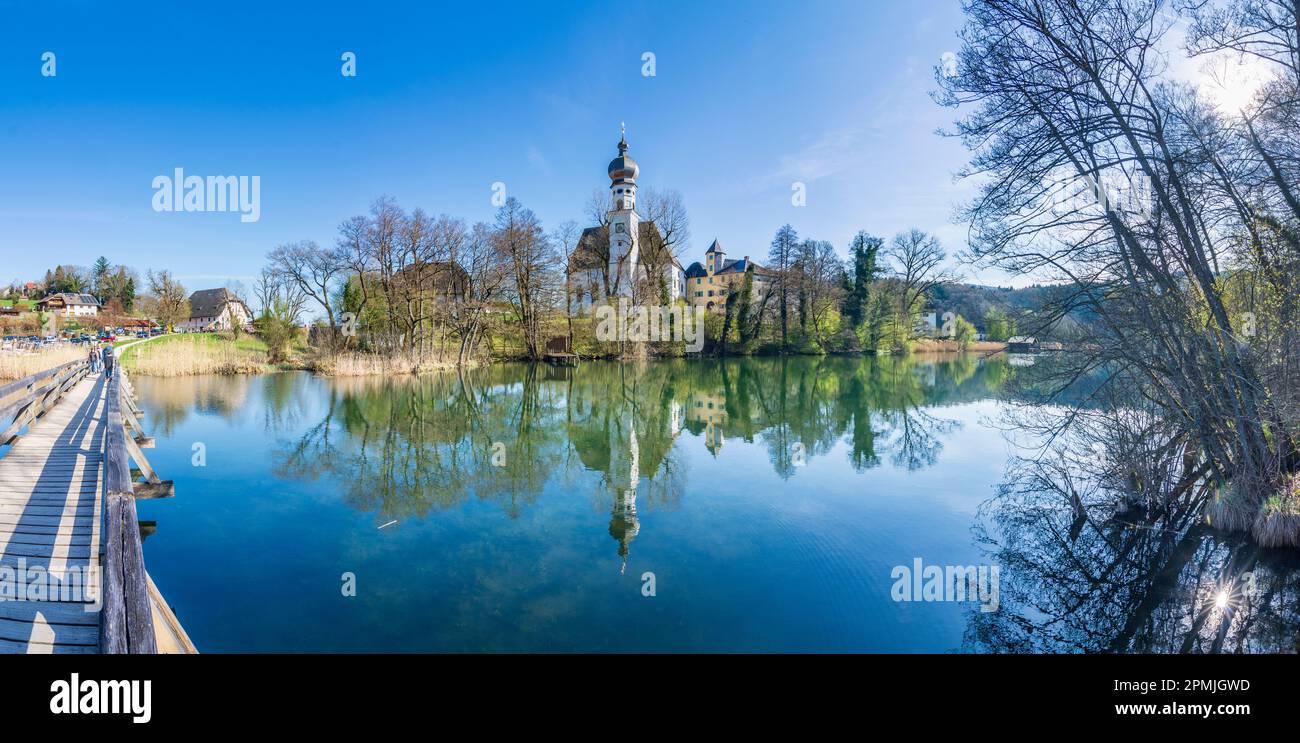 Anger church St. Peter und Paul and former abbey Höglwörth, lake