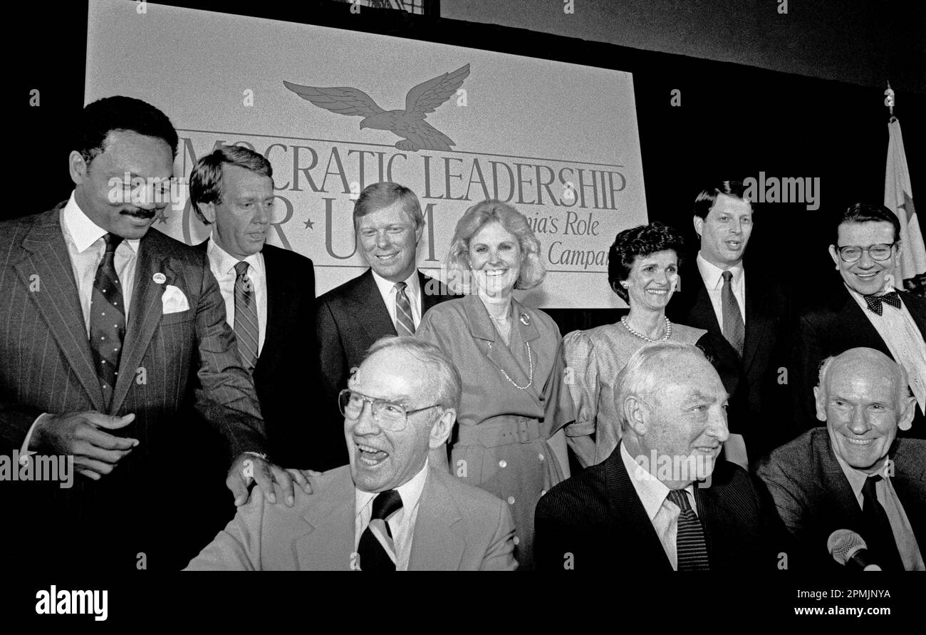 Democratic Leaders Forum in San Francisco, California, 1987. Standing Left to right; Jesse Jackson, Bruce Babbit, Richard Gebhardt, unknown woman, unknown woman, Al Gore, Paul Simon. Seated left to right; Jim Wright, Walter Shorenstein, Alan Cranston. Stock Photo