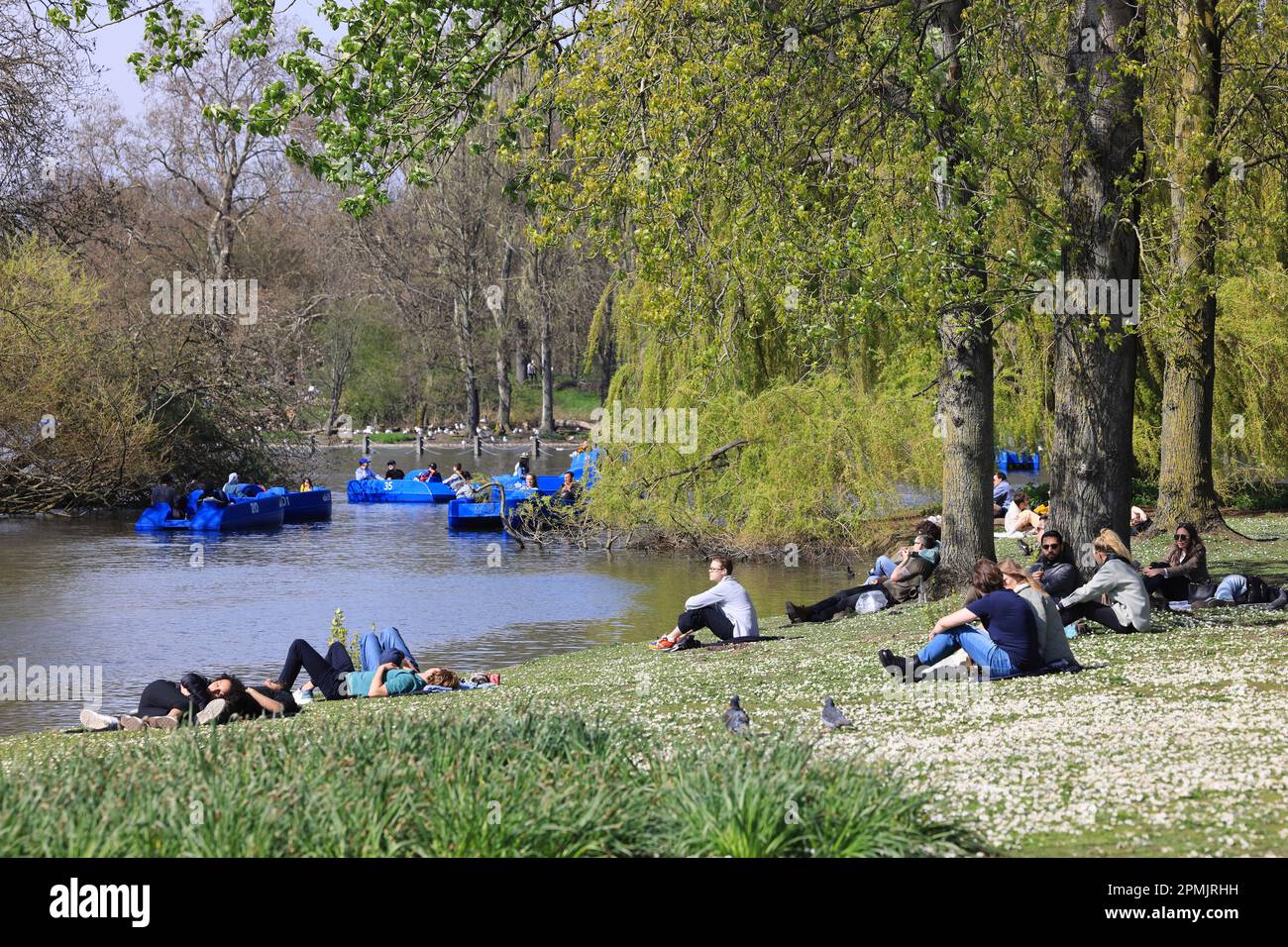 Easter Sunday 2023 in Regents Park, London, crowds enjoy the spring weather by the lake, UK Stock Photo