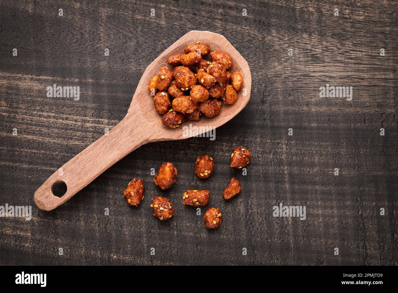 roasted praline peanuts with white sesame seeds Arachis hypogaea
