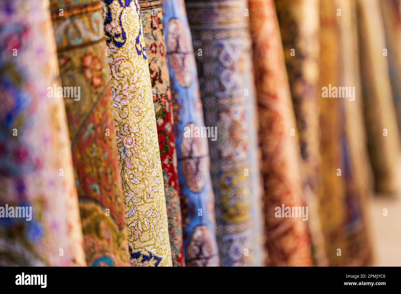 Colorful carpets in silk factory store , Samarkand , Uzbekistan. , Shallow depth f field, copy space Stock Photo