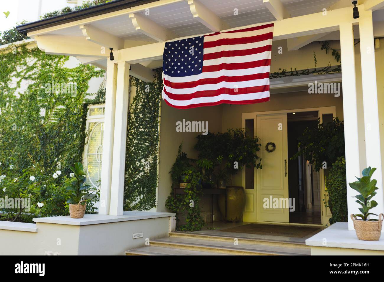 American flag hanging from building hi-res stock photography and images ...