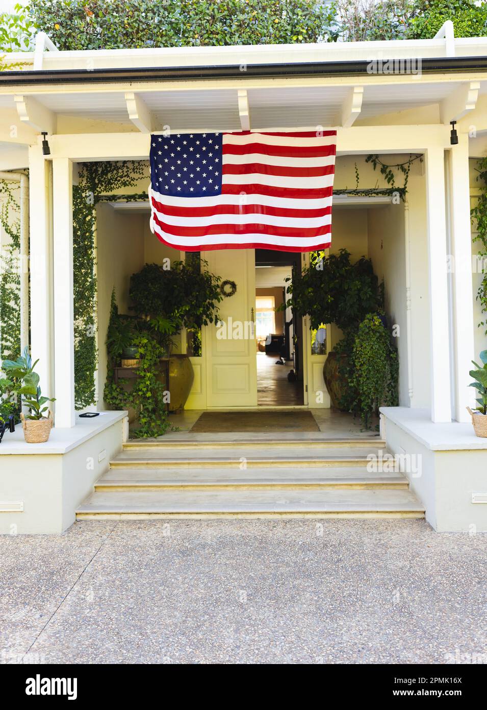 American flag hanging from building hi-res stock photography and images ...