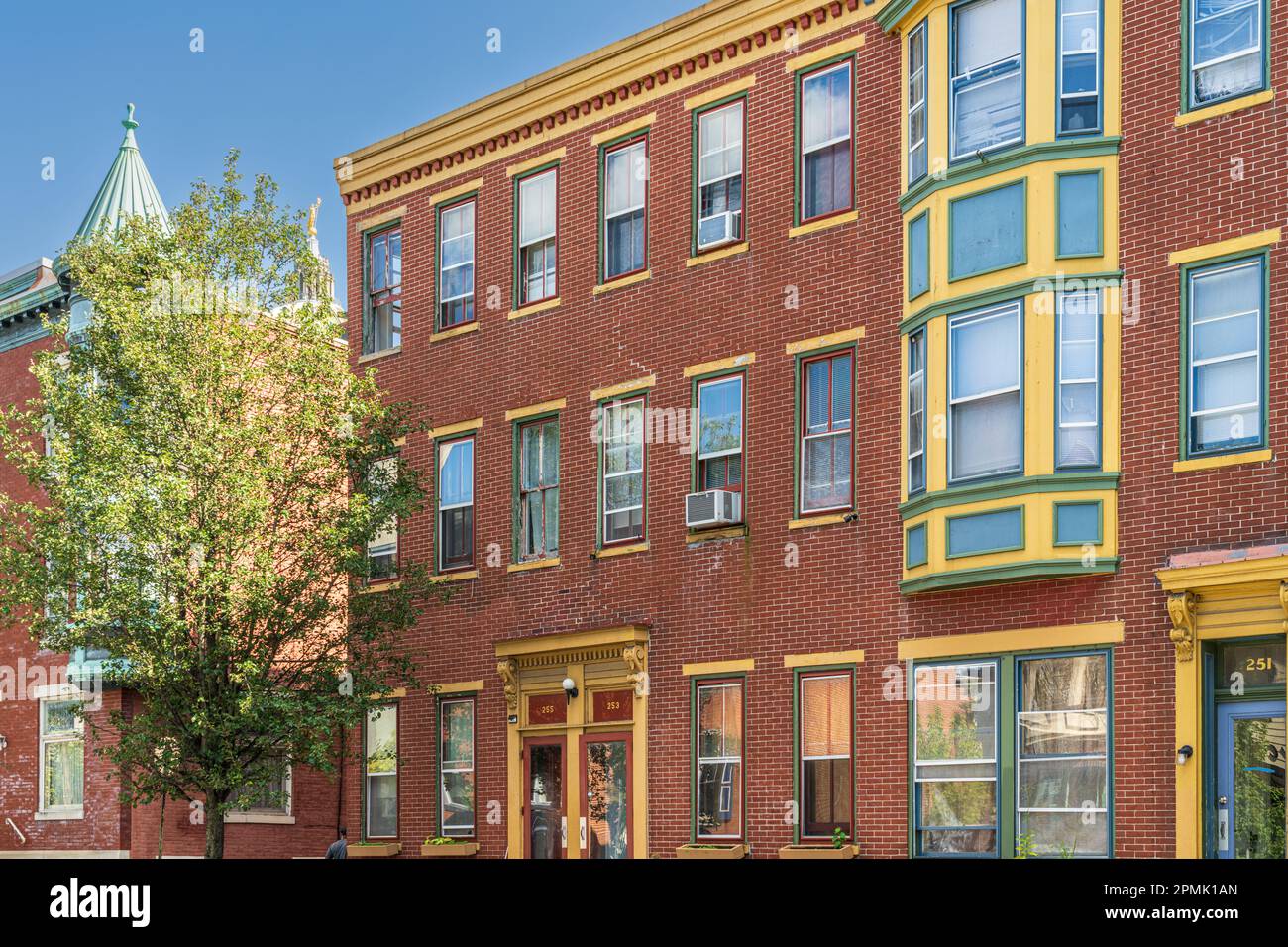 Harrisburg, PA - September 26, 2021: Typical quaint red brick row houses in a city neighborhood in Harrisburg, the capital of Pennsylvania, USA. Stock Photo