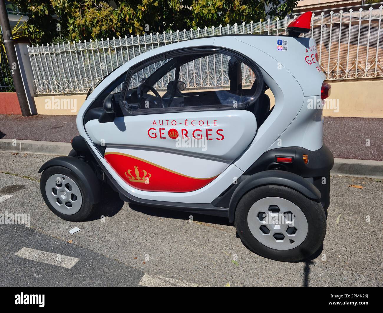 Roquebrune-Cap-Martin, France, 15 Aprilr 2022: Georges Driving School's Renault Twizy 45, an electric and compact vehicle for learner drivers, seen in Stock Photo