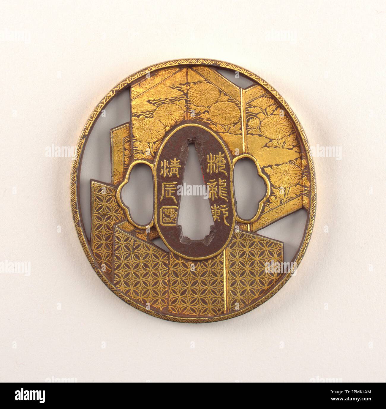 Tsuba (Japan); Made by Bairiuken Kiyonaga (Japanese); iron, gold inlay