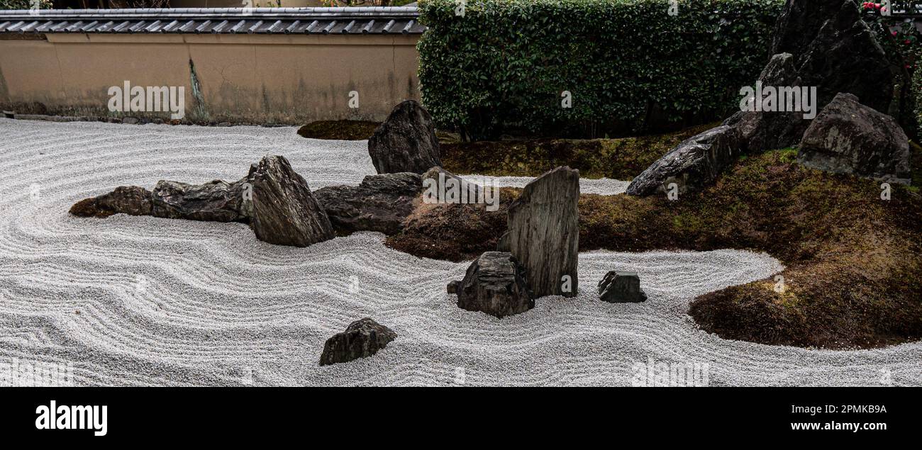 Dokuza-tei or Alone Sitting Garden in Zuihoin, Daitokuji Rinzai Zen temple, designed by Shigemori Mirei with the use of just rocks, gravel, and moss. Stock Photo