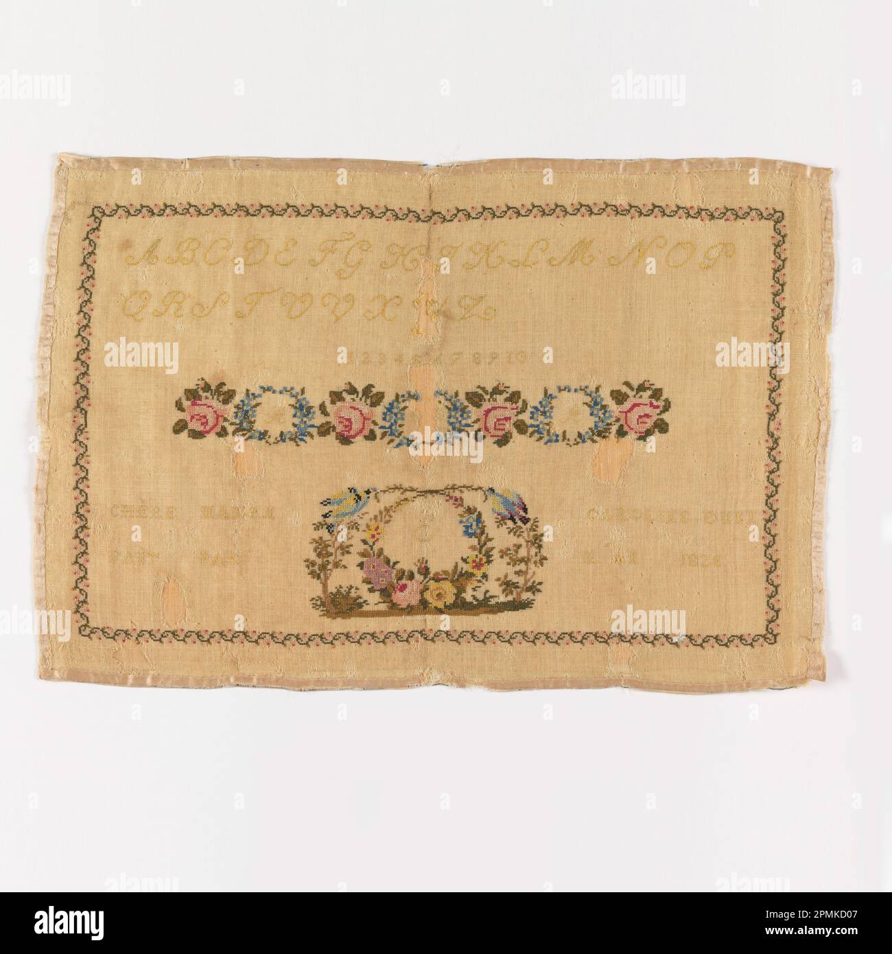 Sampler; Embroidered by Caroline Dunn; silk embroidery, wool foundation; Warp x Weft: 34 x 50 cm (13 3/8 x 19 11/16 in.); Bequest of Mrs. Henry E. Coe; 1941-69-201 Stock Photo