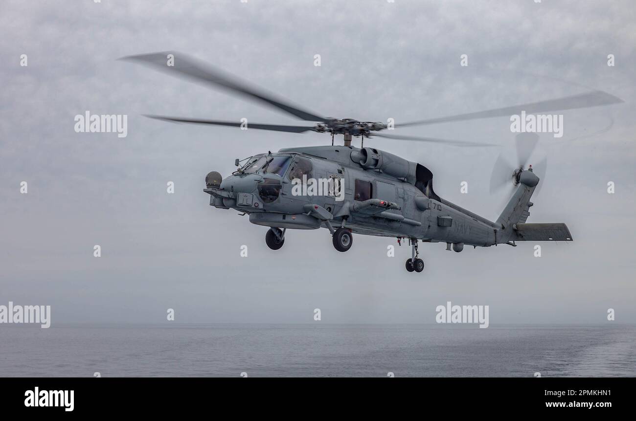 230318-N-NT811-0008 Pacific Ocean - (March 18, 2023) – An SH-60R ...