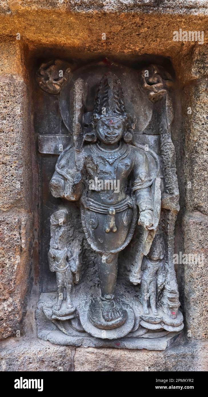 Ekapada Bhairava standing on one leg in one of the  four niches in the central chandi mandapa, Chausath Yogini Temple, Hirapur, Bhubaneshwar, Odisha, Stock Photo